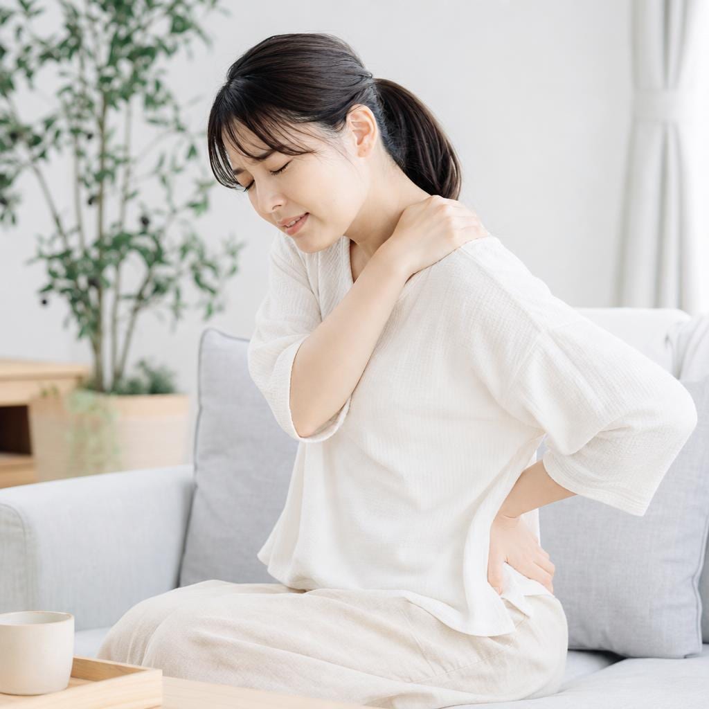 産後の腰痛・肩こりイメージ